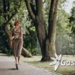 young-woman-riding-scooter-in-park2